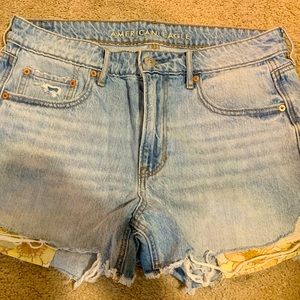 American Eagle cut off shorts with cute flowered yellow pockets